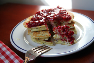 Lemon Poppyseed pancakes with raspberry sauce