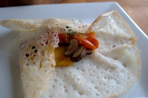 Savory rice crepes with sauteed vegetables