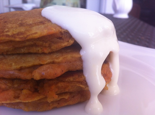 Carrot cake pancakes with orange cream cheese glaze