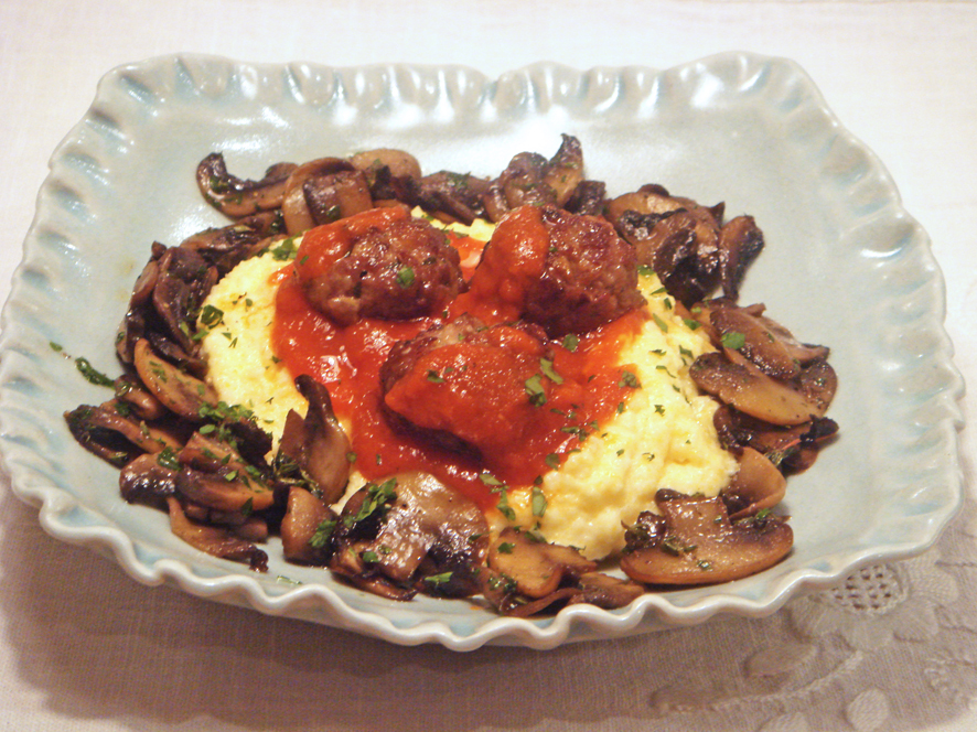 Polenta with spicy meatballs and sautéed mushrooms