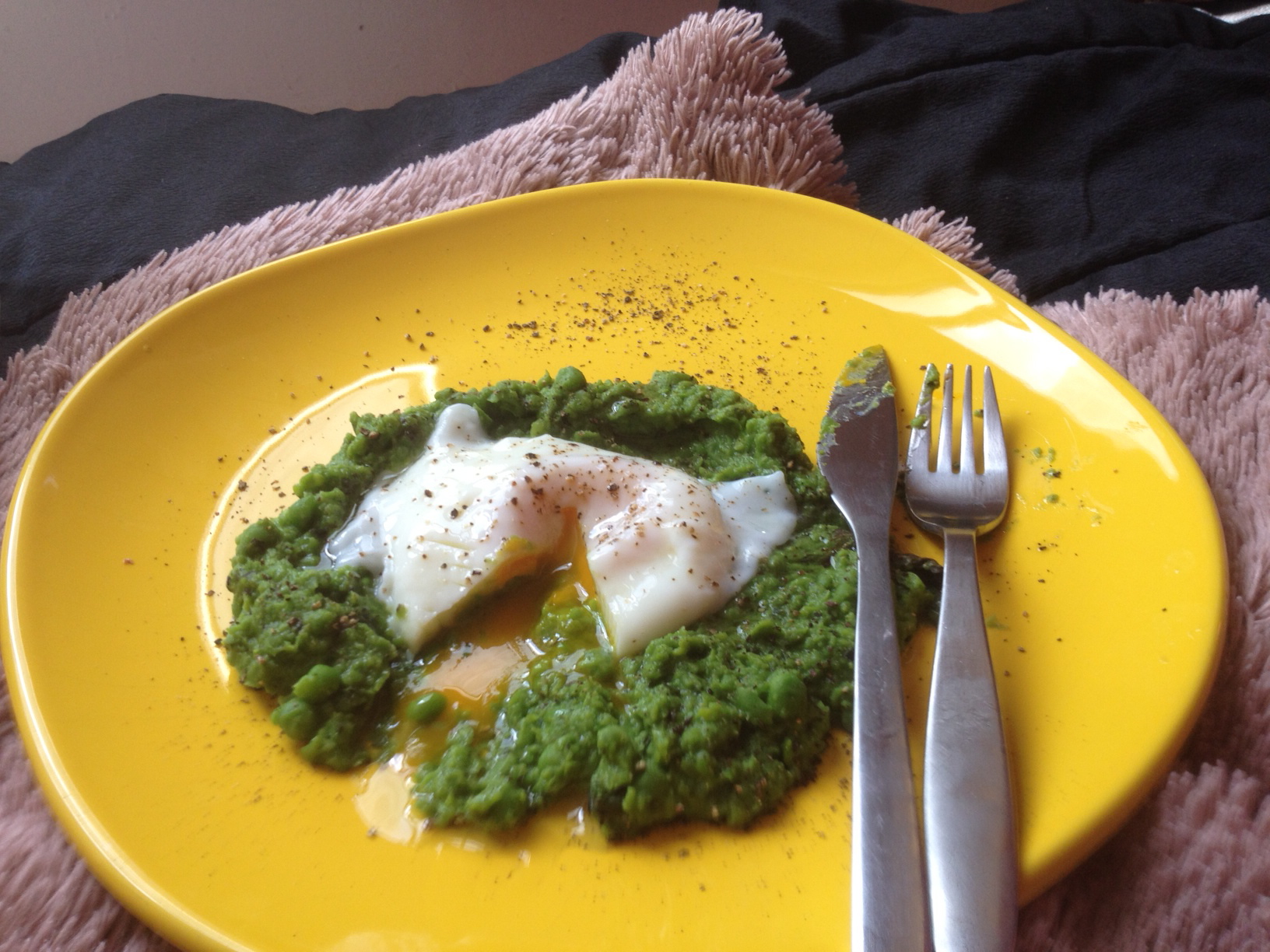 Poached egg on mint spring pea puree with truffle oil