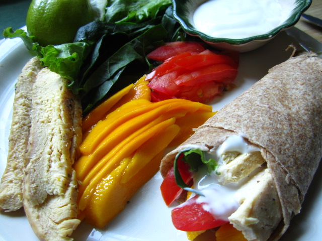wholewheat chicken mango wrap with lime yogurt sauce.