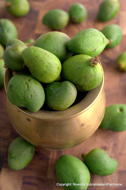Pickled Baby mangoes in a chile mustard sauce (vadu Mangai)