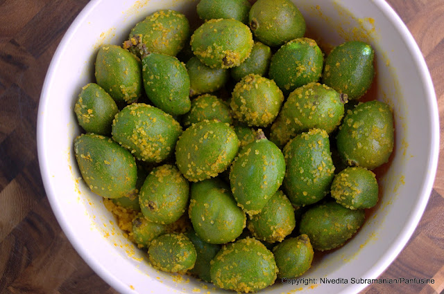 Pickled Baby mangoes in a chile mustard sauce (vadu Mangai)