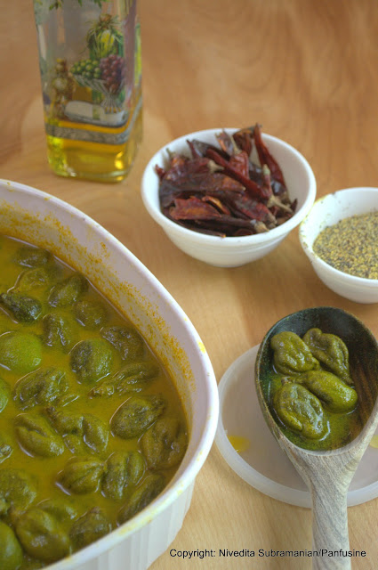 Pickled Baby mangoes in a chile mustard sauce (vadu Mangai)