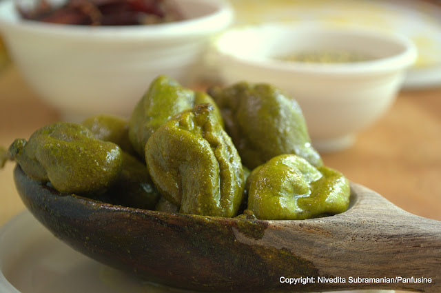 Pickled Baby mangoes in a chile mustard sauce (vadu Mangai)
