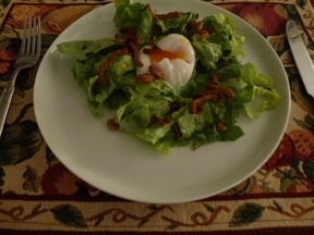 Green salad with poached egg, duck jerky crumbles & duck crackling