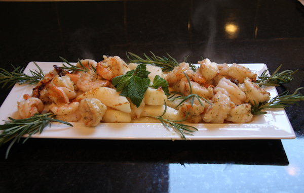 Shrimp and Calamari with Mint Pesto on Sprigs of Rosemary. 