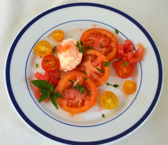 Heirloom tomato salad with fresh mozzarella, watermelon and mint