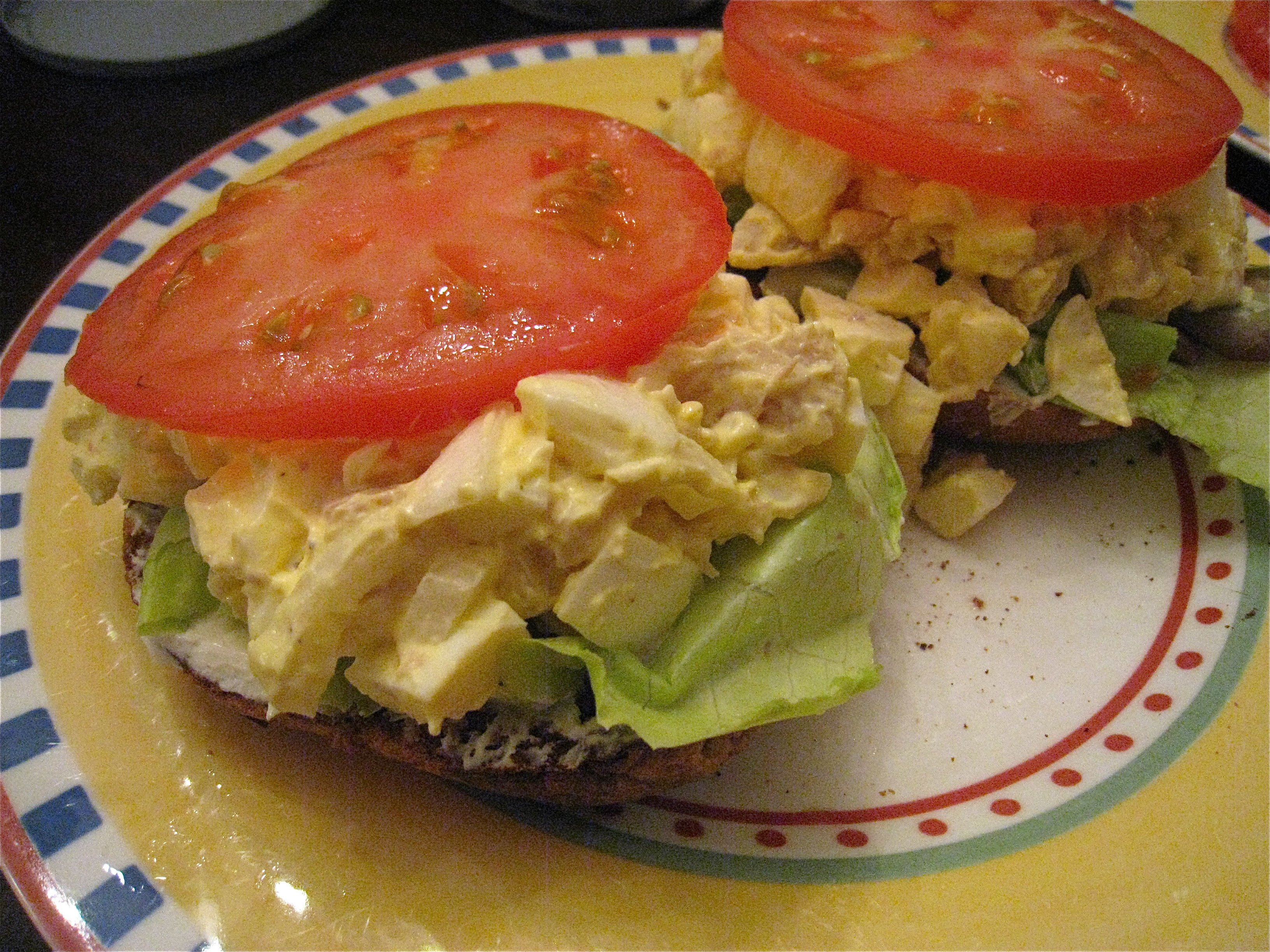Smoked Trout, Egg, and Onion Salad on a Toasty Bagel