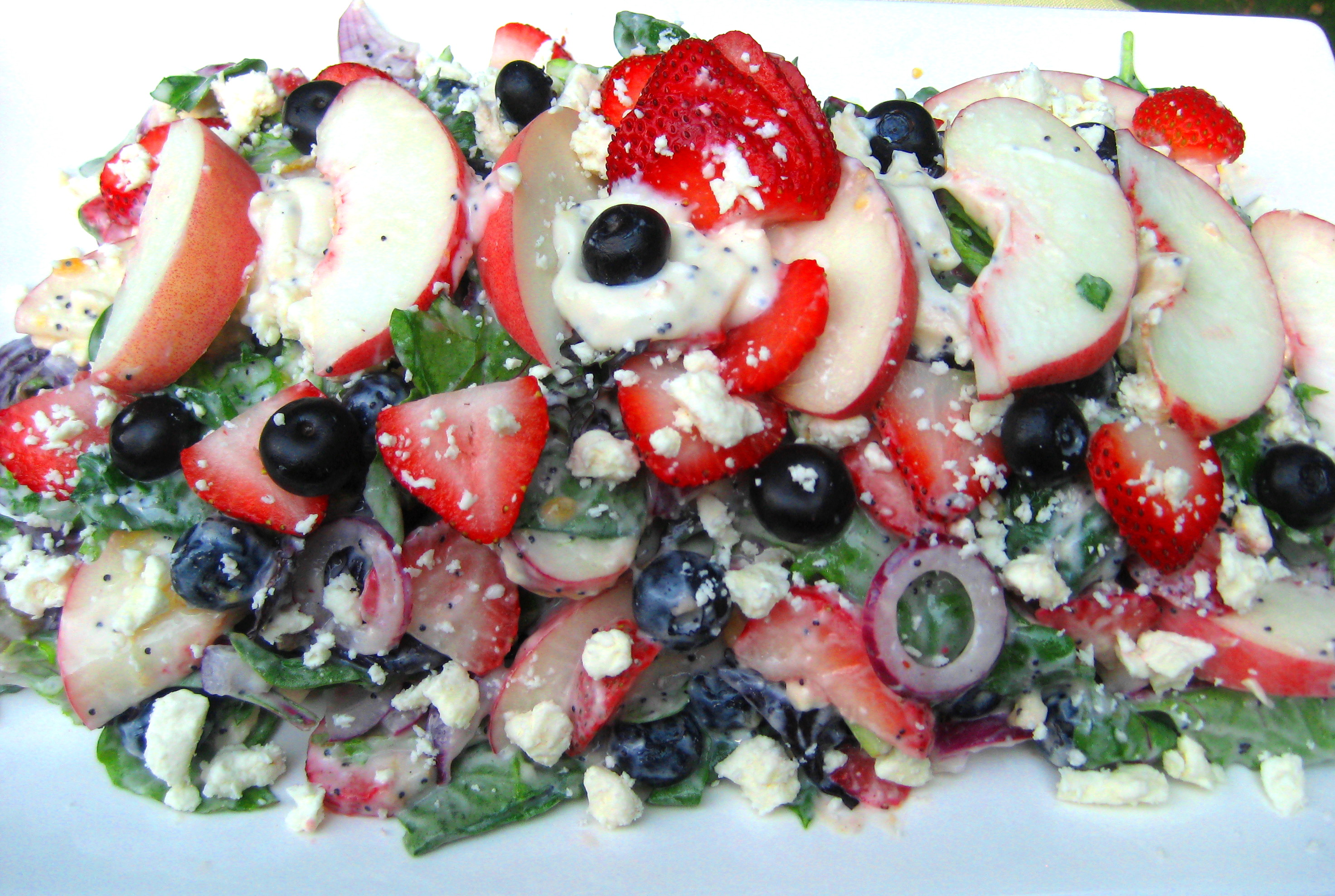 Peaches 'n Berries, Red Onion, Feta  Greens with Creamy Poppy Seed  Dressing