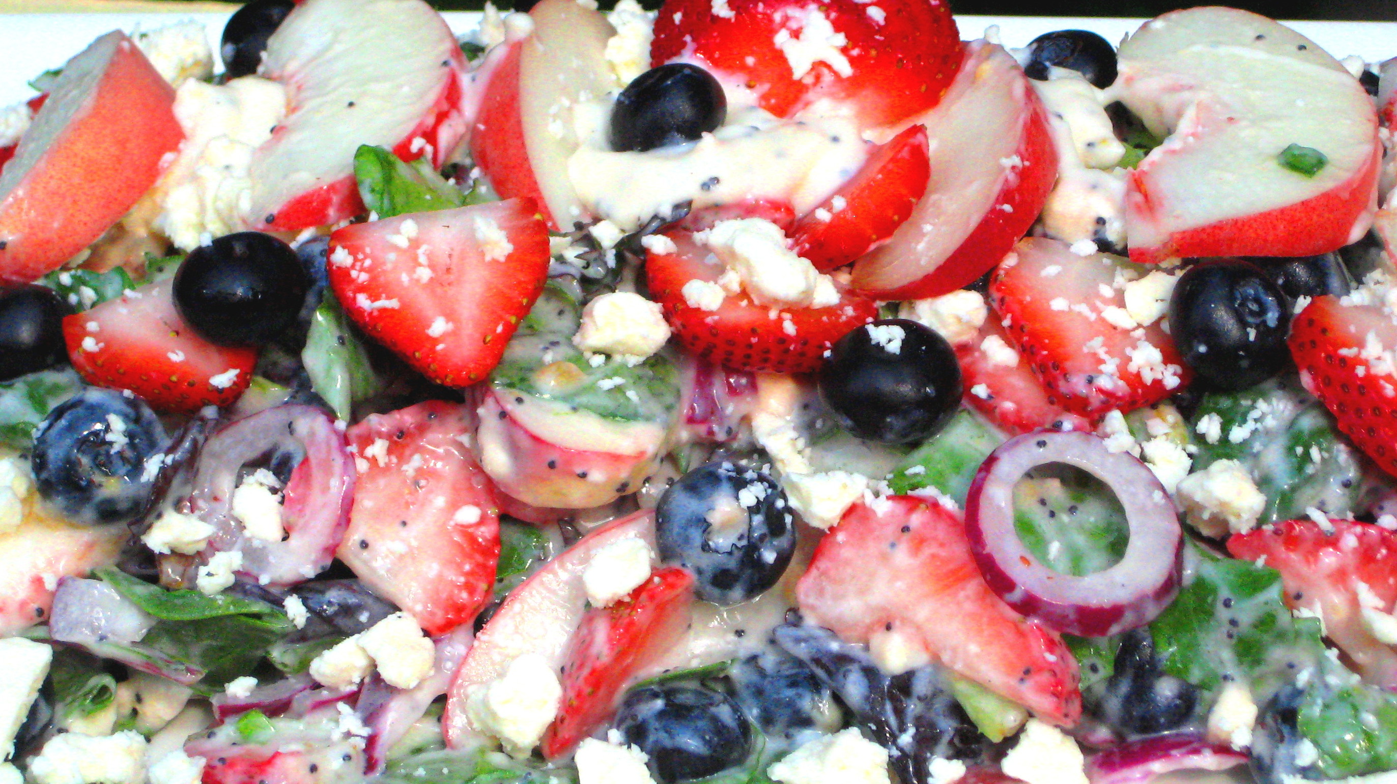 Peaches 'n Berries, Red Onion, Feta  Greens with Creamy Poppy Seed  Dressing