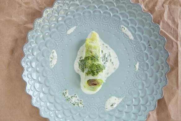 Braised lamb in cabbage leaves