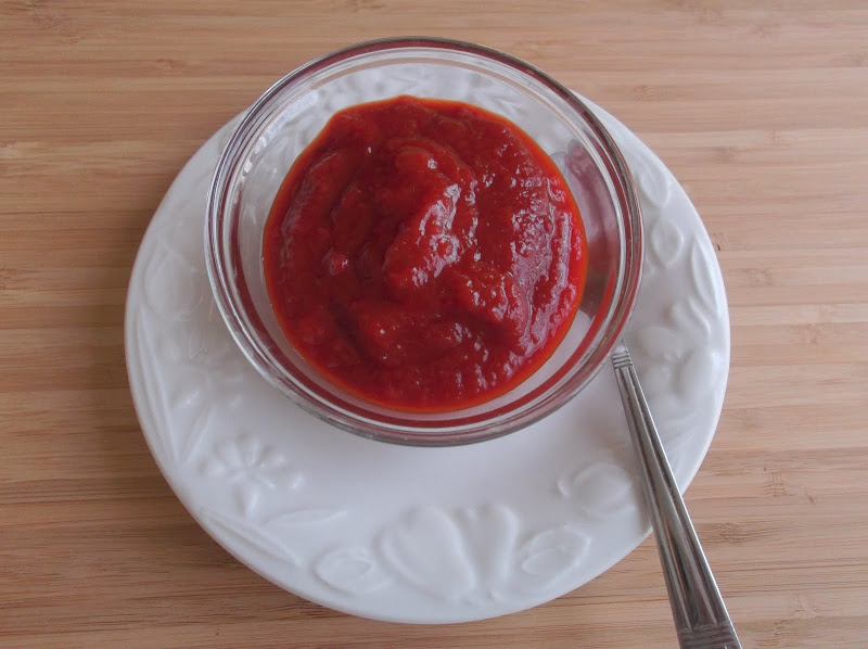Shrimp Cooked in Smoked Sausage and Roasted Red Bell Pepper Jam Sauce