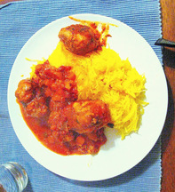 Turkey meatballs on spaghetti squash in a bell pepper ragu