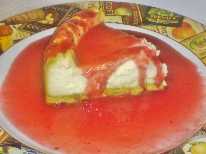 Cheesecake with Cranberry Pomegranate Sauce