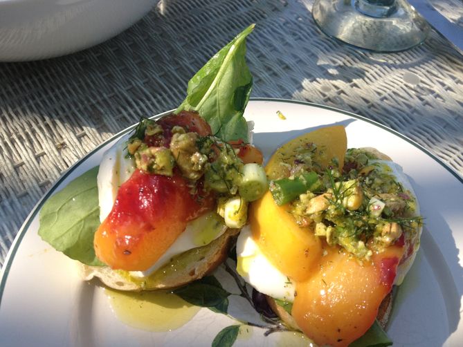 Mozzarella With Persimmon, Serrano Ham and Pistachio Fennel Oil Crostini