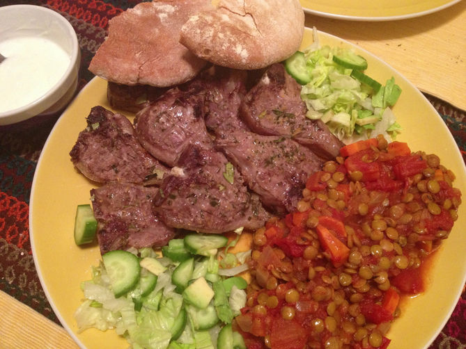Lamb loin chops with lentils in the tomato sauce