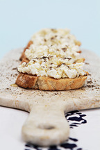 Crostini with ricotta, truffle honey and smoked salts