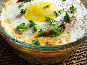 Baked Eggs over Roasted Tomatoes and Citrus Herb Couscous