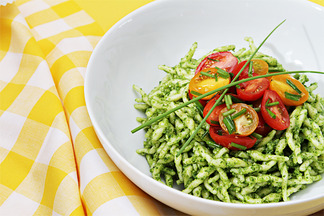 Trofie with Arugula Pesto and Flash-Sautéed Cherry Tomatoes with Garlic Scapes