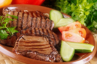 Grilled Calf's or Beef Liver Served With A Famous Romanian Sauce Mujdei