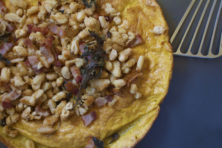 Pumpkin Dutch Baby Pancake with Bacon-Roasted Beans + Oregano