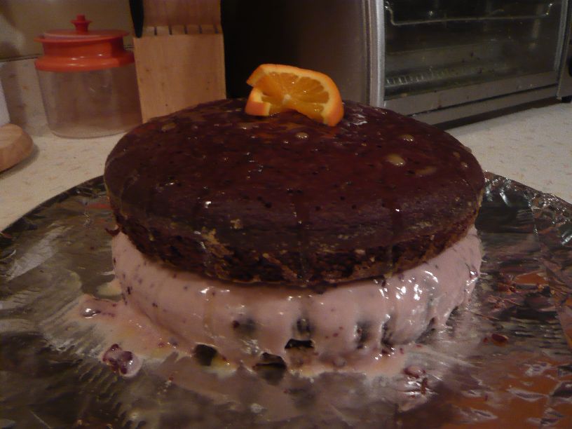 Chocolate Chip Chocolate Cake With Raspberry Cream Filling and Orange Almond Drizzle