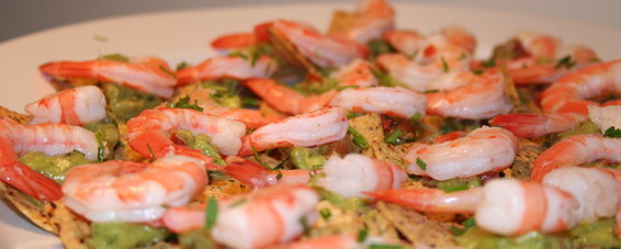 Avocado & shrimp topped multigrain tortilla chips