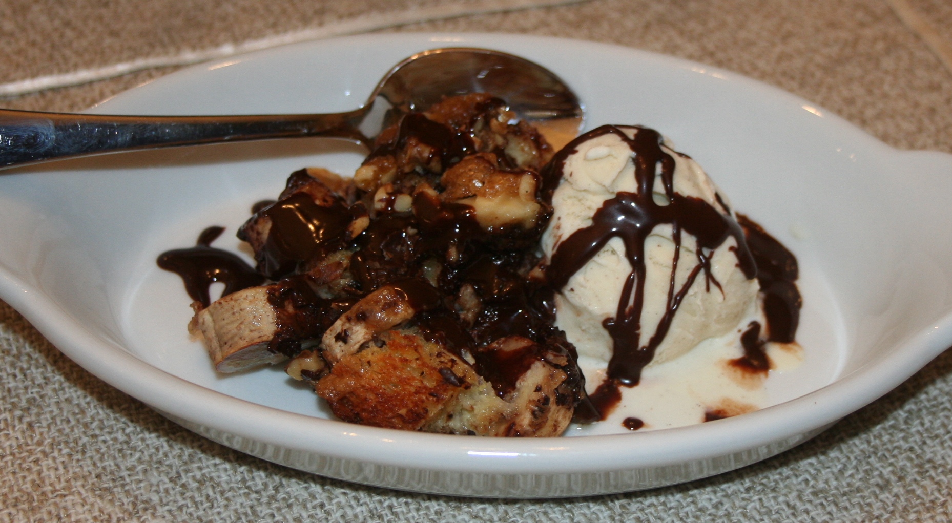 Chunky Monkey Bananas Foster Bread Pudding with Chocolate Sauce