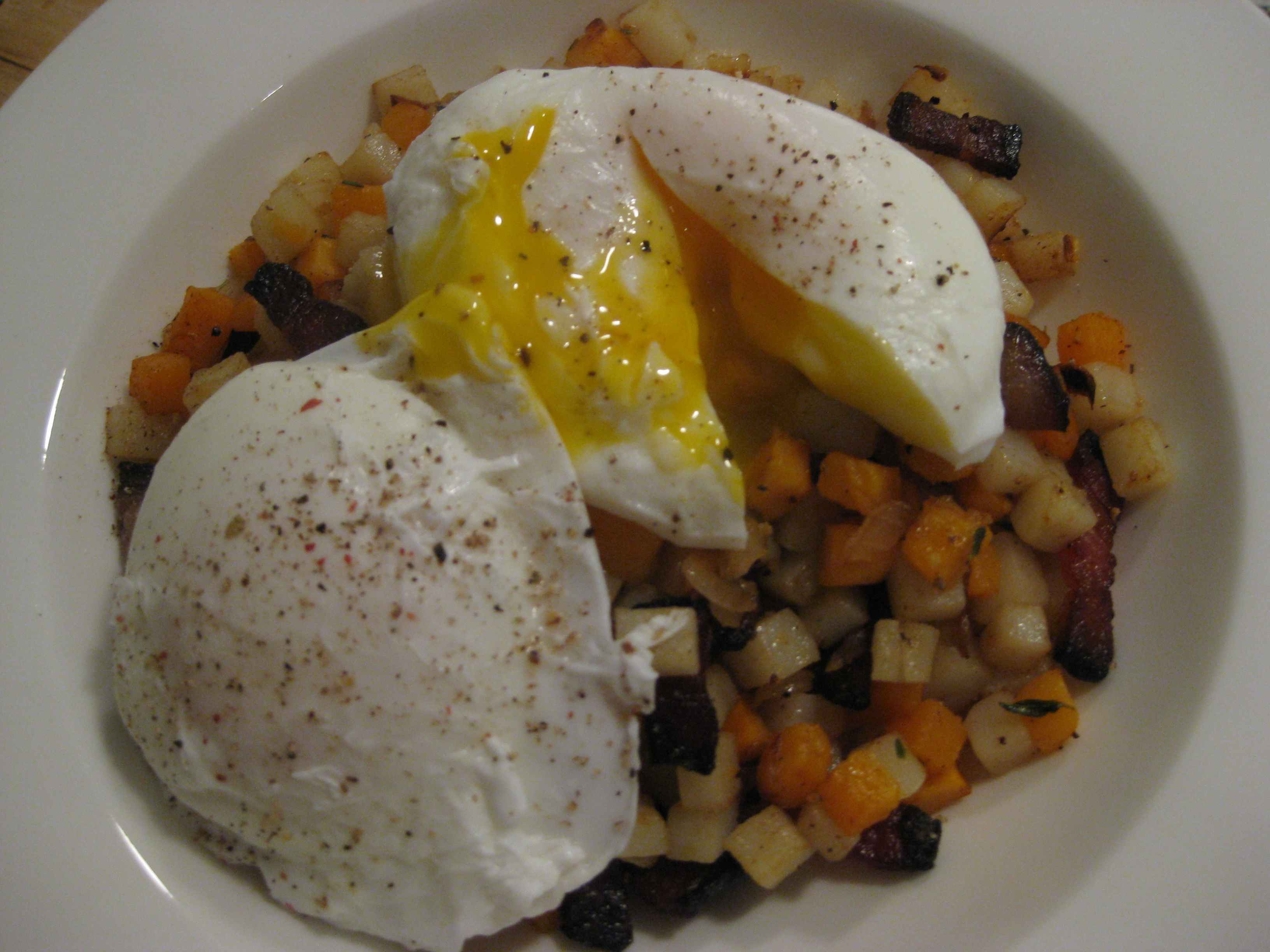 Mixed potato hash with bacon and eggs