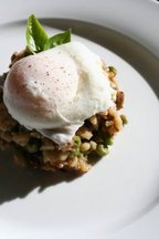 Farro Risotto with Sausage, Mushroom, Peas, and a Poached Egg