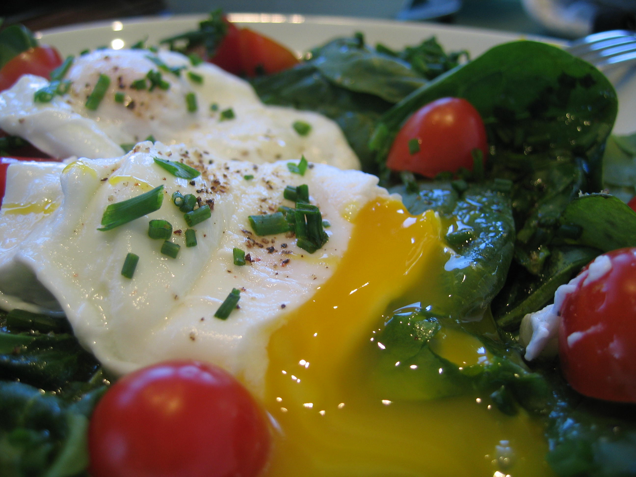Poached Eggs over Baby Spinach w/ Chives and Cherry Tomatoes