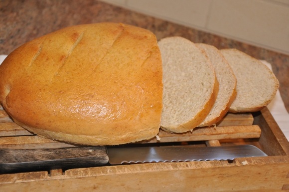 Dinner_table_bread_sliced_on_board