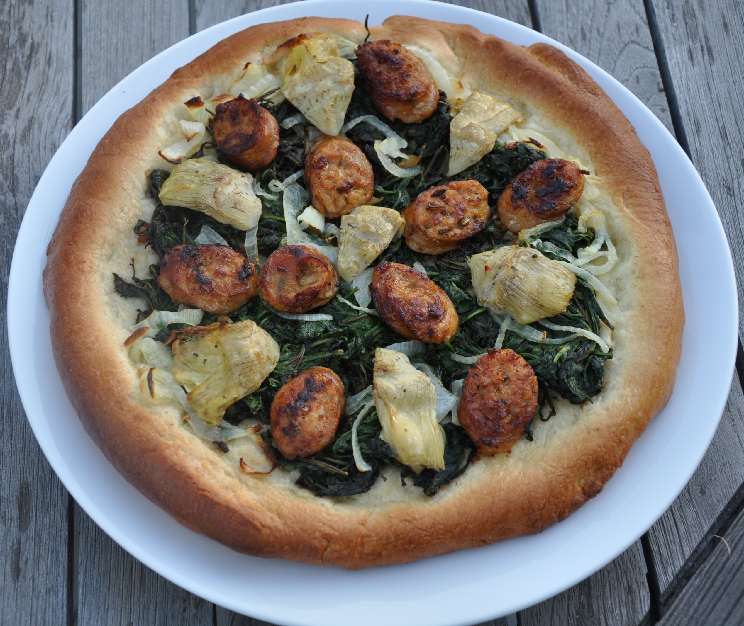 Pizza with White Wine Crust, Italian Sausage and Artichoke Hearts