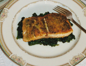Falafel Crusted Salmon on a Bed of Spinach