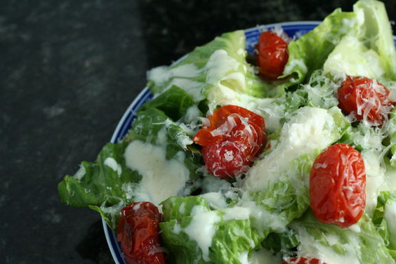 Goat Cheese Caesar Salad with Roasted Tomatoes and Parmesan Crisp