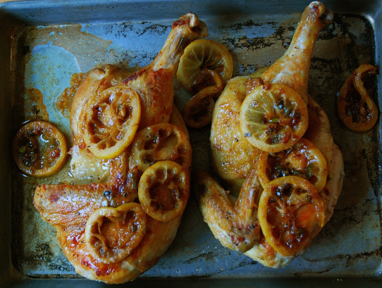 Brick Chicken with Garlic Scapes and Lemon.