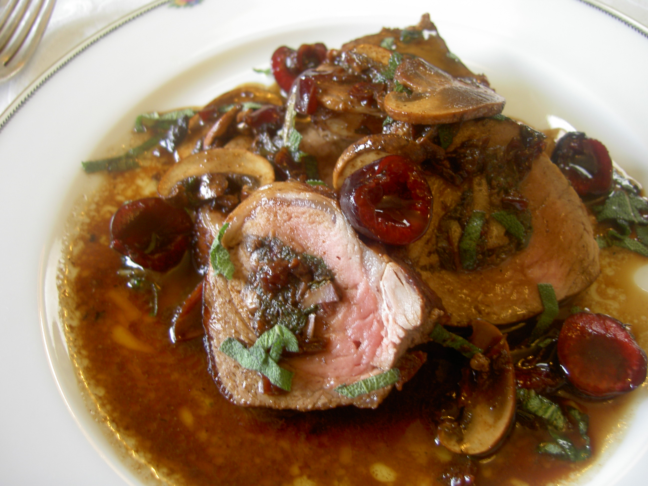 Cherry & Swiss Chard Stuffed Pork Tenderloin with a Cherry Sage Sauce