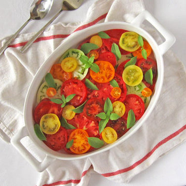 Heirloom Tomatoes Simply Sliced & Served with Lemon Basil