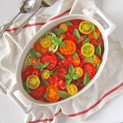 Heirloom Tomatoes Simply Sliced & Served with Lemon Basil
