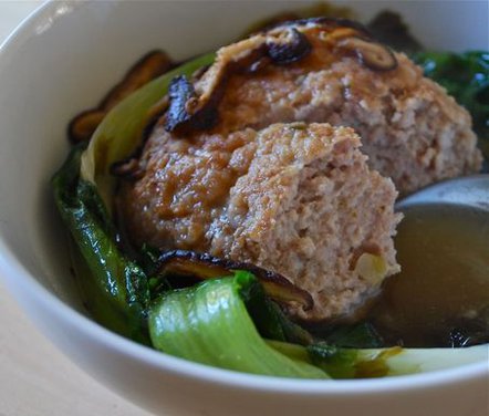 Stewed pork meatballs and escarole with crisped shiitakes