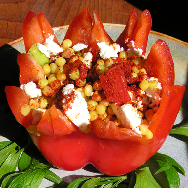 Fresh stuffed red pepper shells with pearl couscous, forbidden rice, kamut or red quinoa