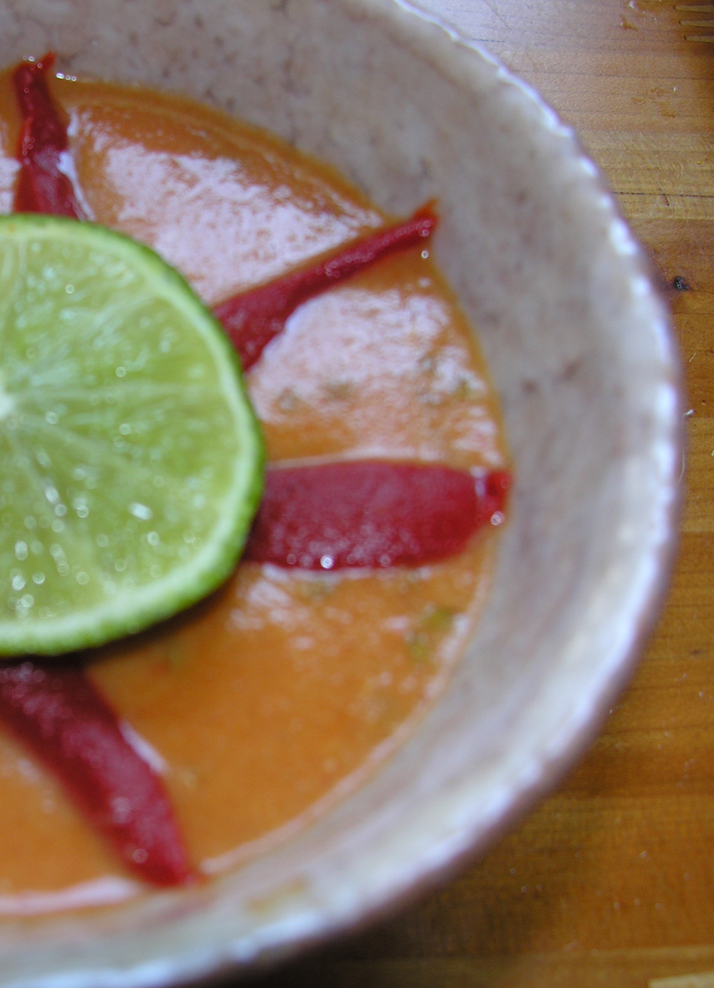Hot paprika red pepper shorba soup with lime