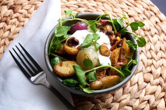 Roasted Fingerling Potatoes & Cipollini Onions with Cress, Sundried Tomatoes, Oregano, & Blue Cheese Crema