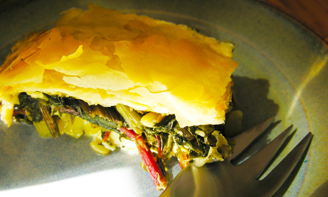 Harvest pie with swiss chard, cheese, orange zest and fennel