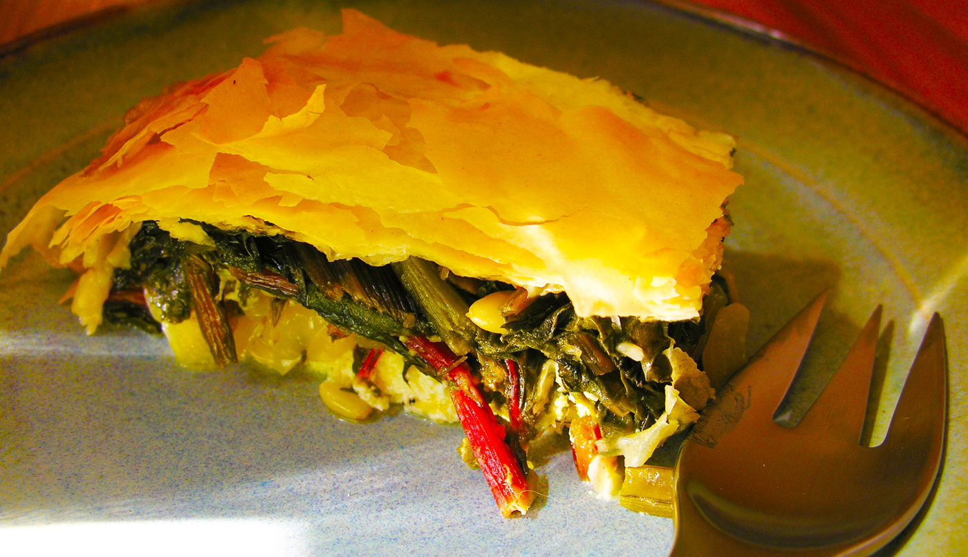 Harvest pie with swiss chard, cheese, orange zest and fennel
