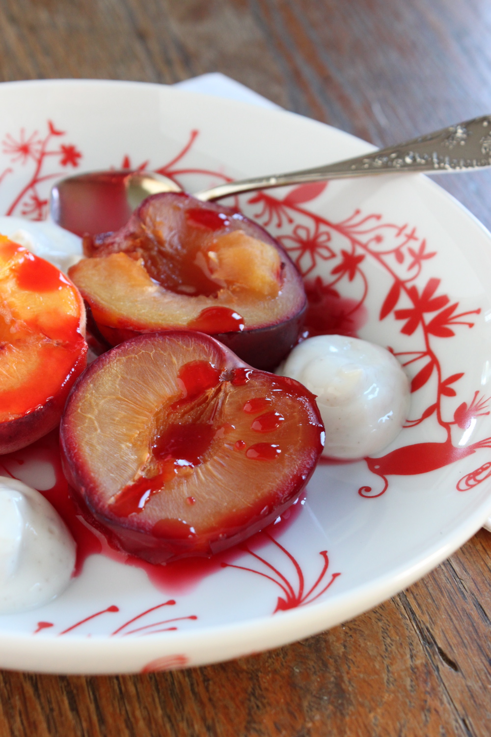 Roasted plums with bay leaf creme anglaise