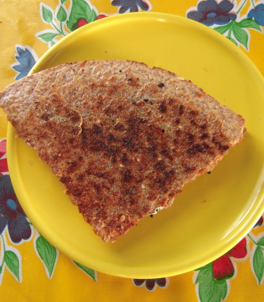 Roasted vegetable, goat cheese, and spinach quesadilla with spicy tomato jam