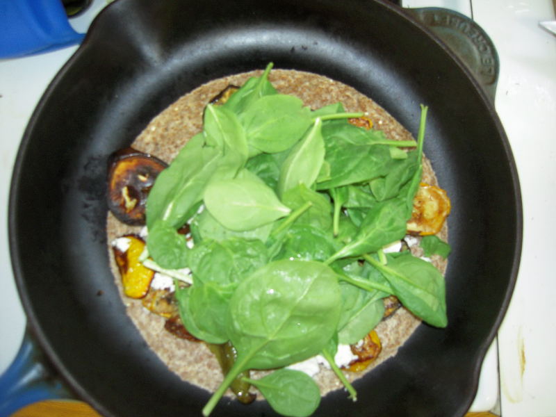 Roasted vegetable, goat cheese, and spinach quesadilla with spicy tomato jam